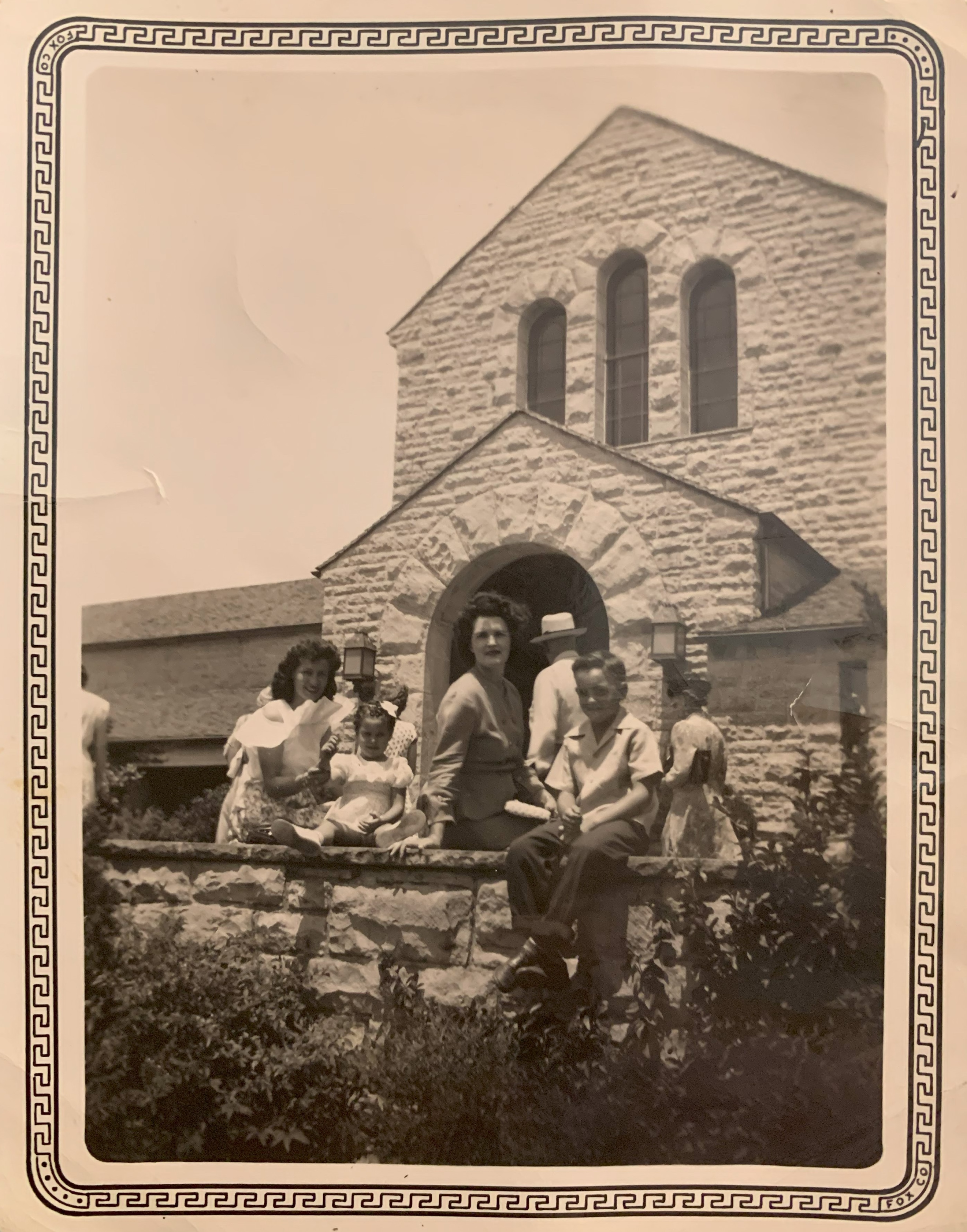 A group of people posing for a photo  Description automatically generated