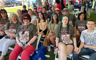 May be an image of 7 people, people standing and outdoors